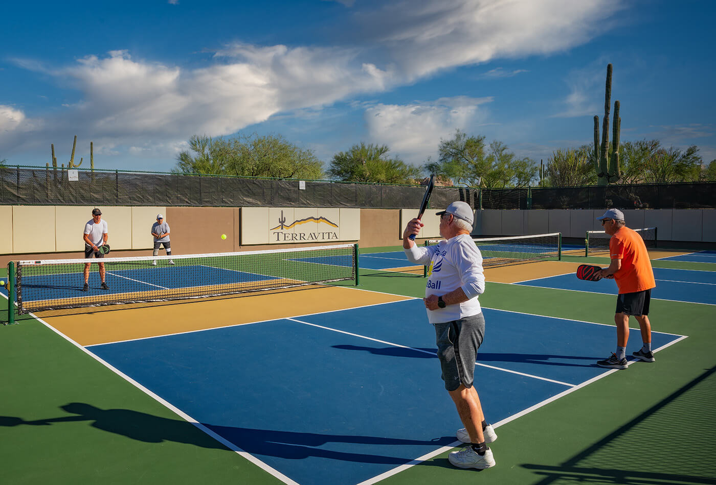 pickleball players on court